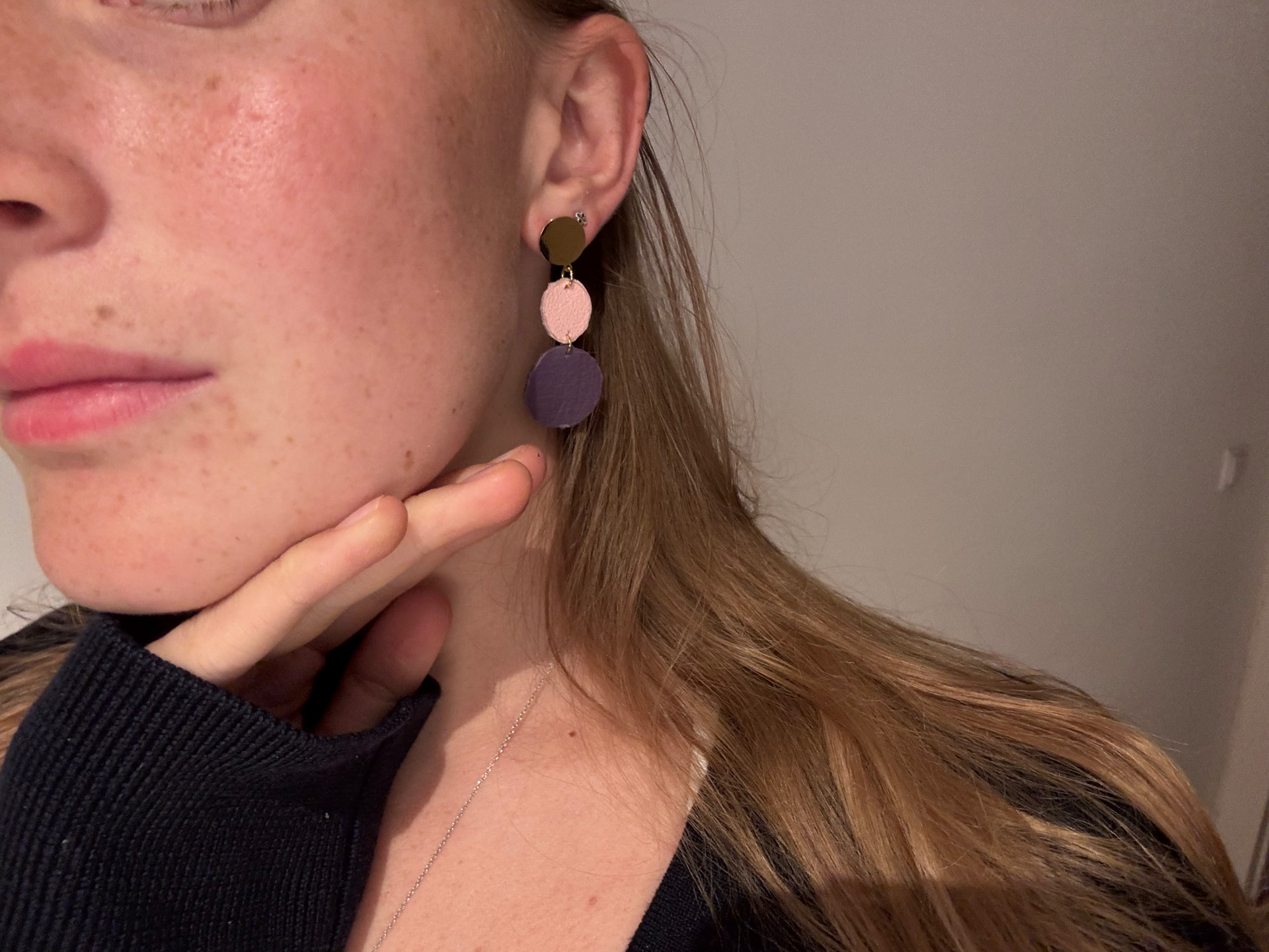 A Malin Marie wearing the Marie earrings