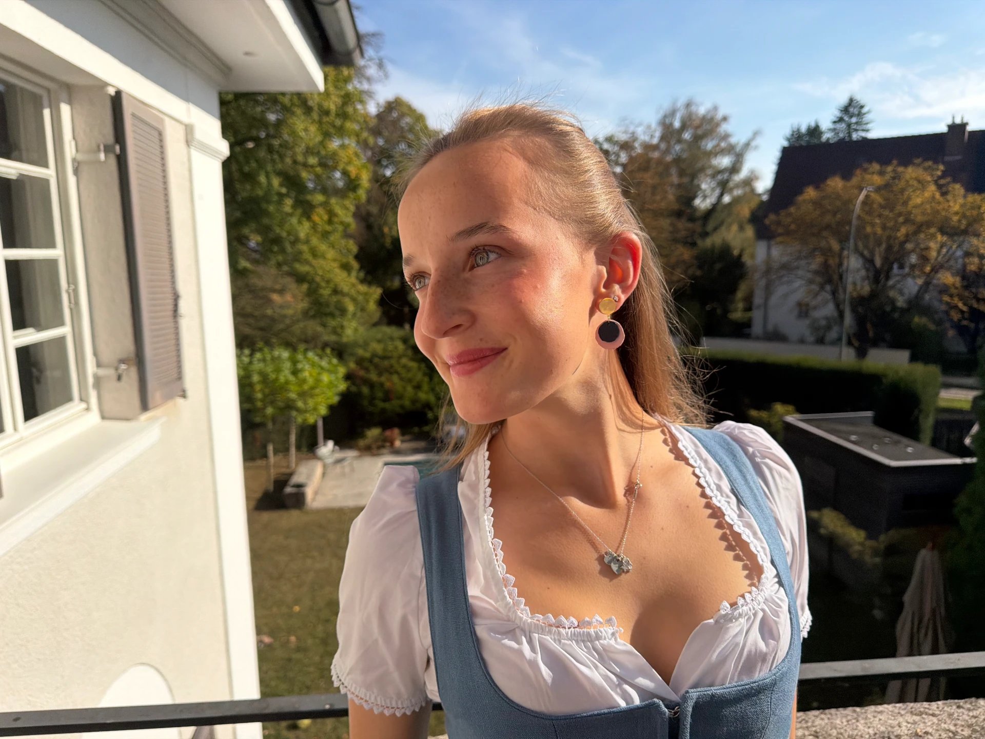 A Malin Marie wearing the Cleo earrings
